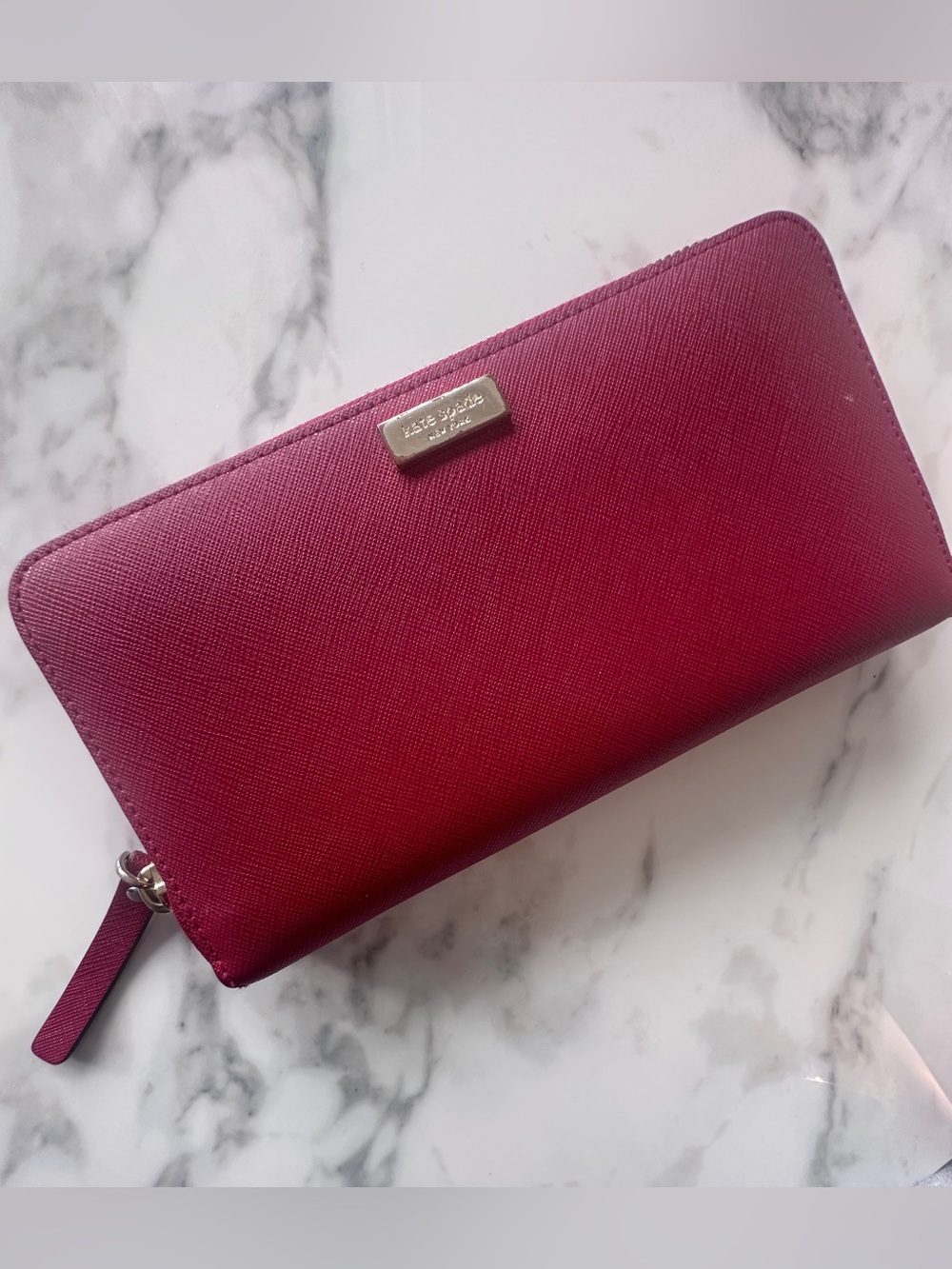 kate spade zip-around wallet in raspberry